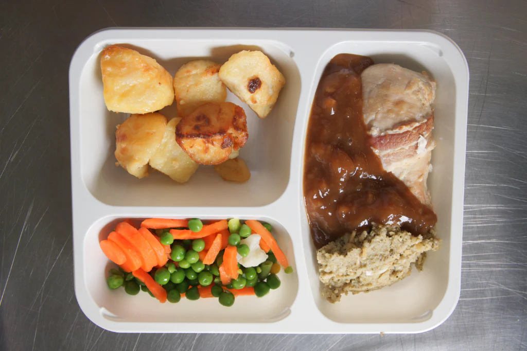Classic roast chicken, vegetables, roast potatoes and gravy - Image 4